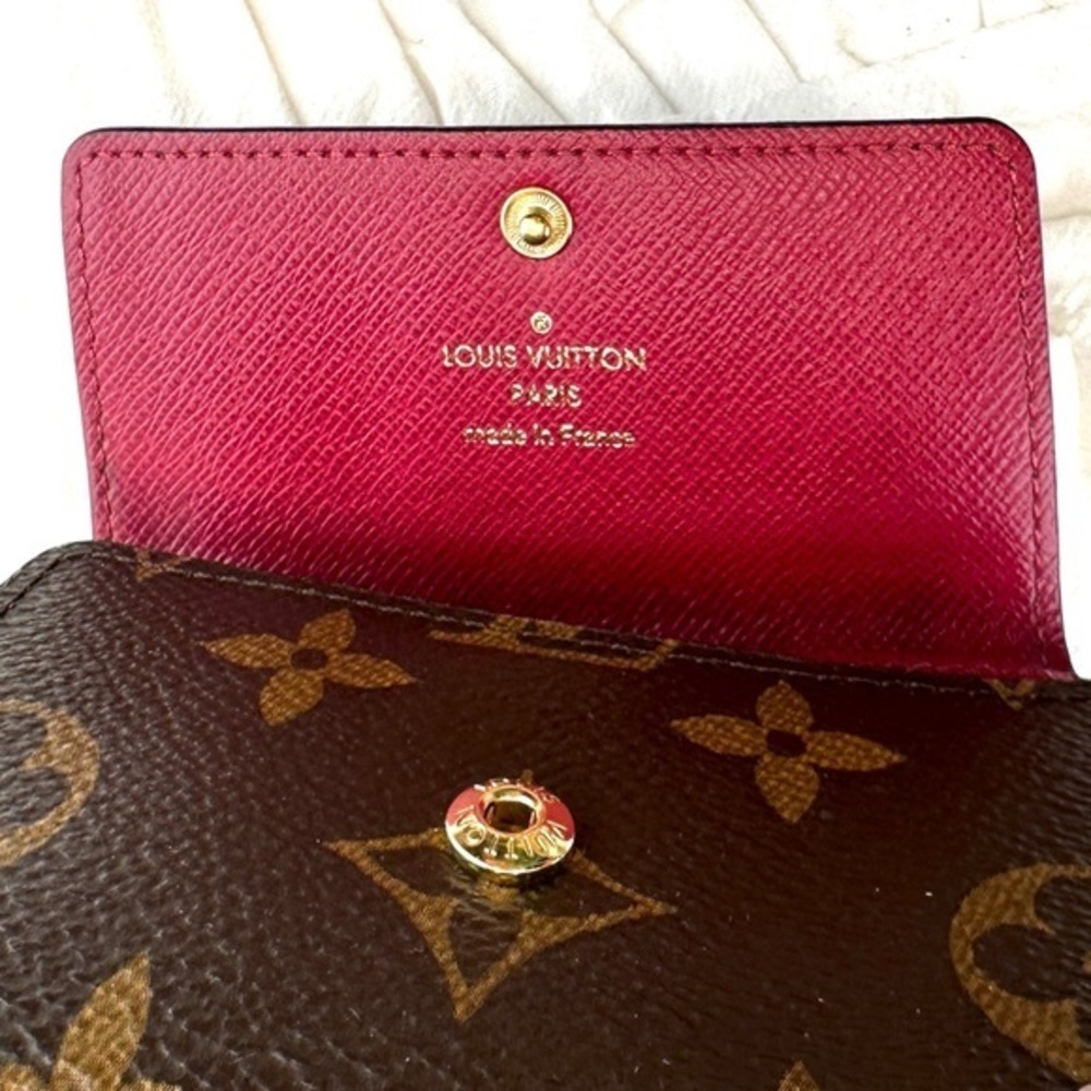 AUTHENTIC Louis Vuitton key holder. Monogram pattern. Magenta interior. - Picture 8 of 15